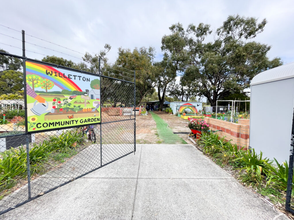An open gate leading into Willetton Community Garden.